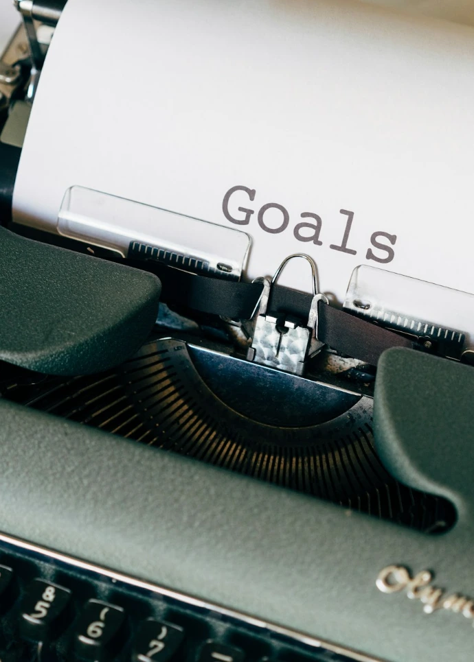 black and white typewriter on green textile
